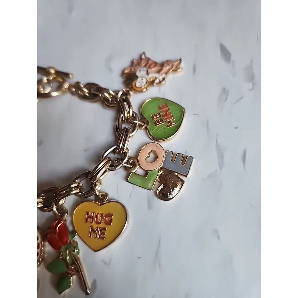 Charm Braclet, Love, Valentine's Day, Hearts, Hugs and Kisses Gold Tone Braclet.